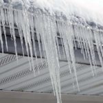 ice dam causing water damage in aspen, colorado