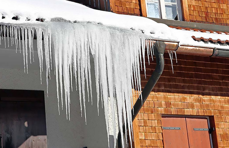 ice dam causing roof and flood damage in Carbondale, CO