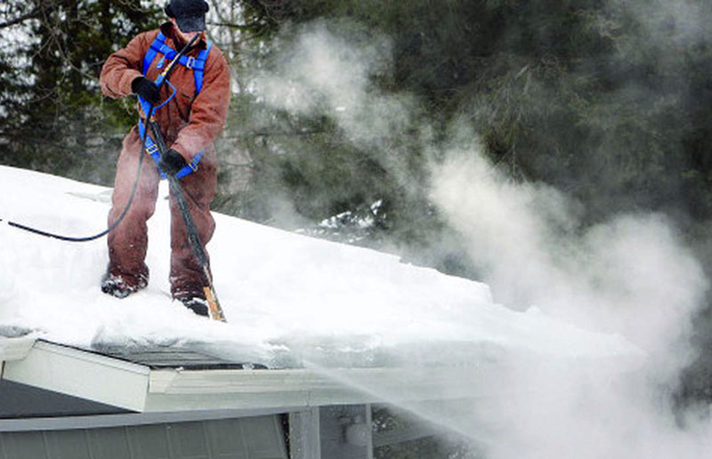 steam removal of an ice dam in Basalt, colorado